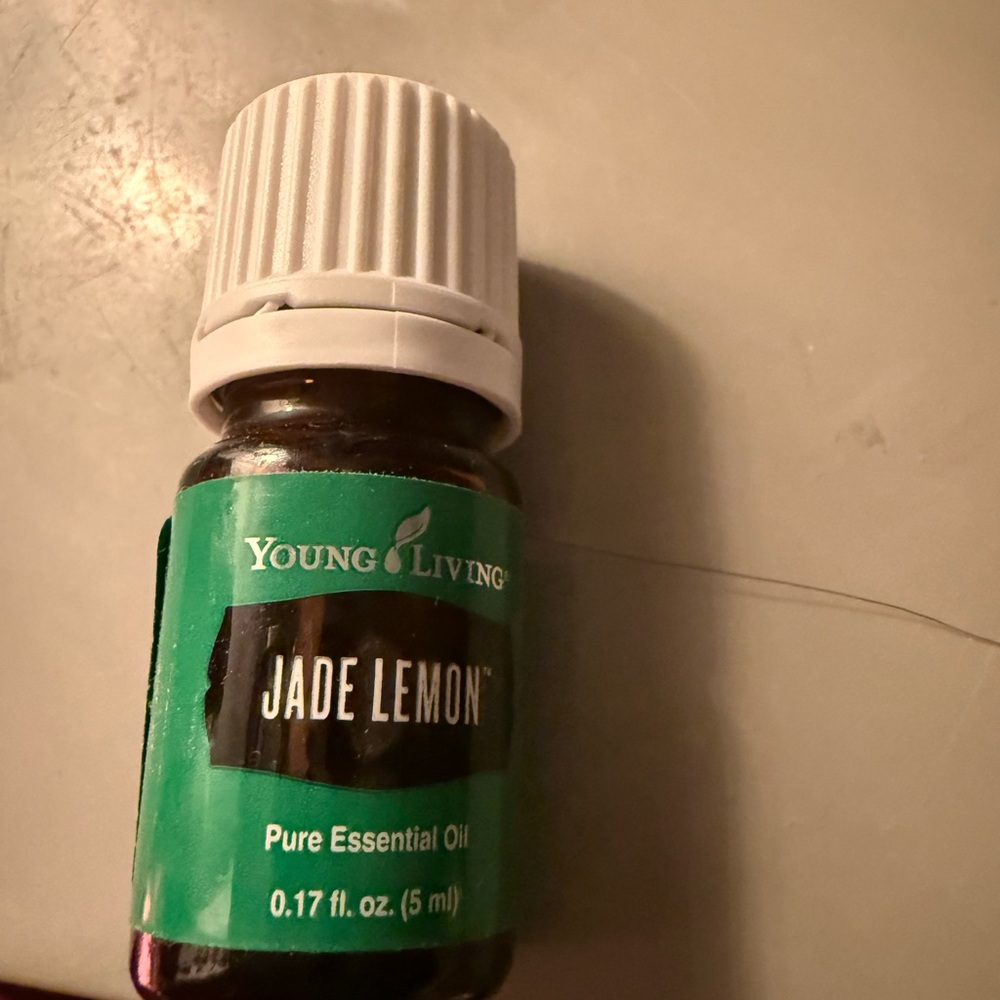 Young Living Jade Lemon Oil in Green Bottle